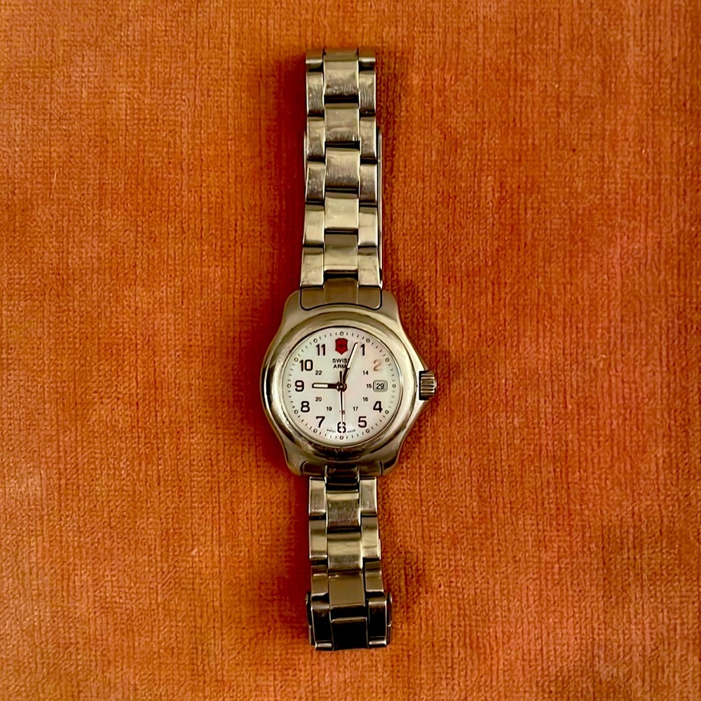 Women’s Swiss Army stainless steel Watch with mother of pearl face.